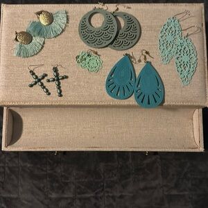 Women’s teal colored earrings